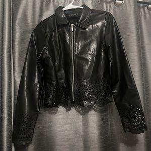 New black faux leather jacket from Pakistan. Brand: Breakout outerwear